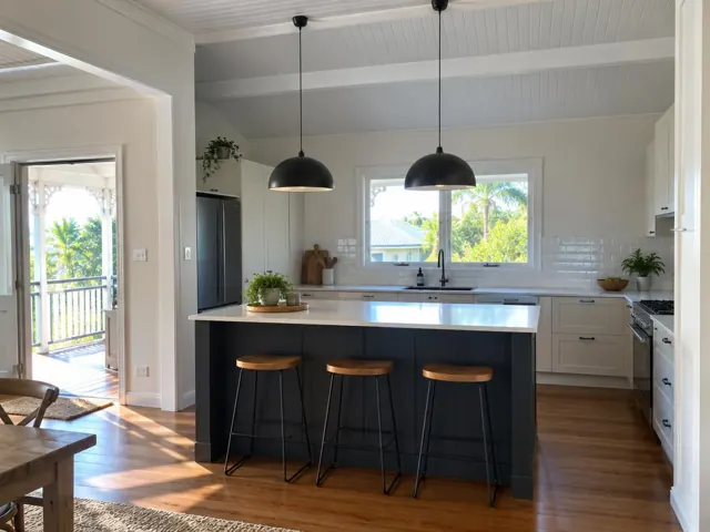 Kitchen with two black pendant lights over an island, timber floors and white cabinetry in Mudgeeraba